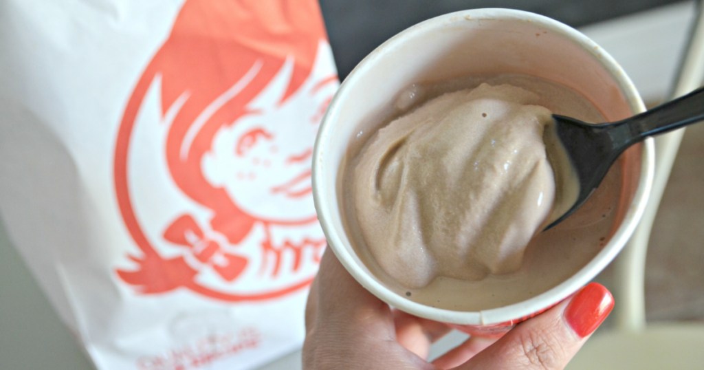 Person holding Wendy's frosty with chocolate ice cream