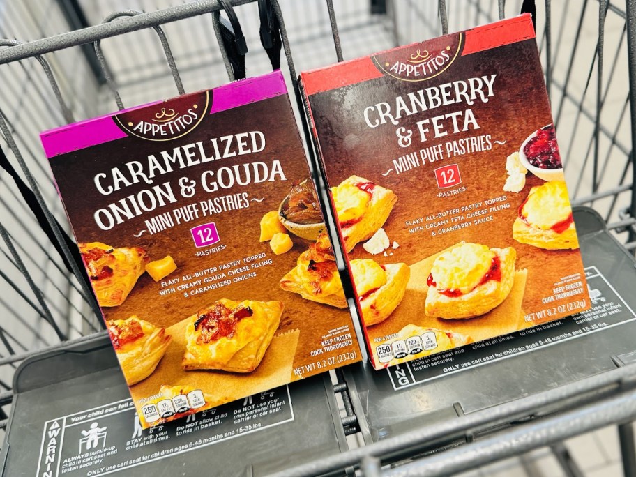 two boxes of mini puff pastries in cart 