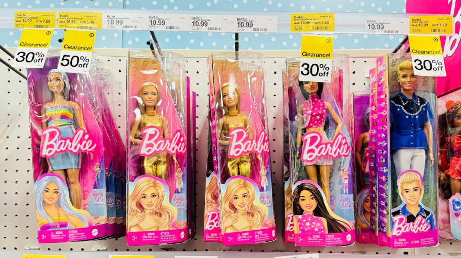 barbie dolls hanging in target store