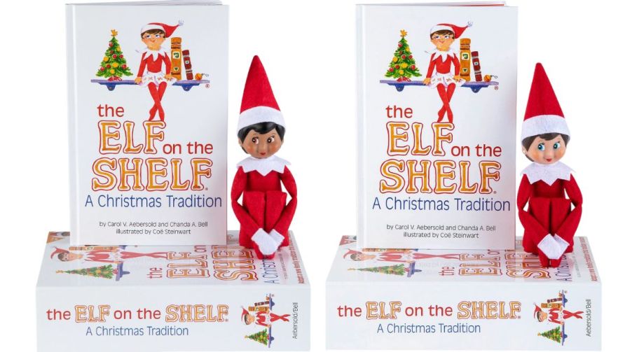 two girl elf on the shelf dolls stock image