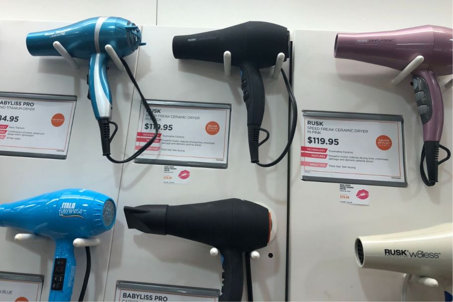 hair dryers on a display wall at ulta