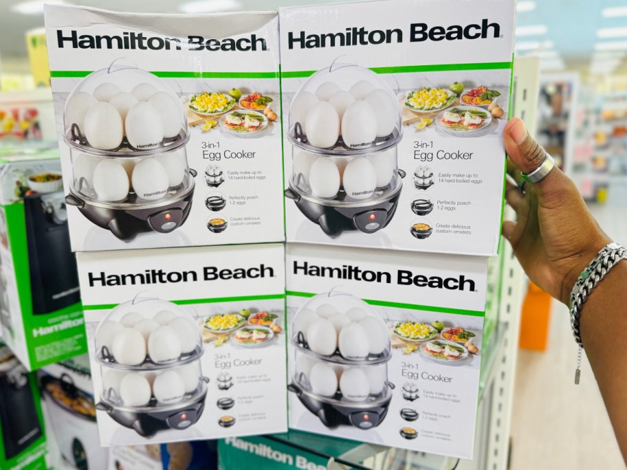 hand holding Hamilton Beach 3-in-1 Egg Cooker