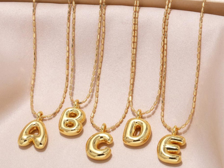 bubble letter necklaces