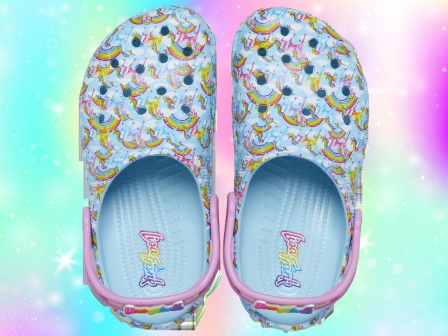 Crocs Girl's Lisa Frank Rainbow Classic Clogs against rainbow background