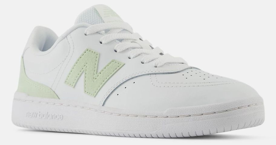 white and light green New Balance Shoes