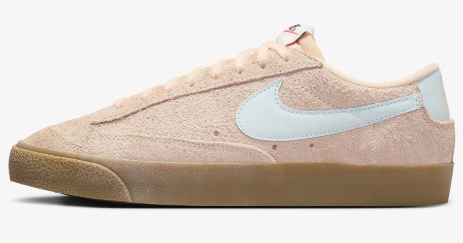 women's Nike blazer low top sneaker in pink with white accents and rubber sole