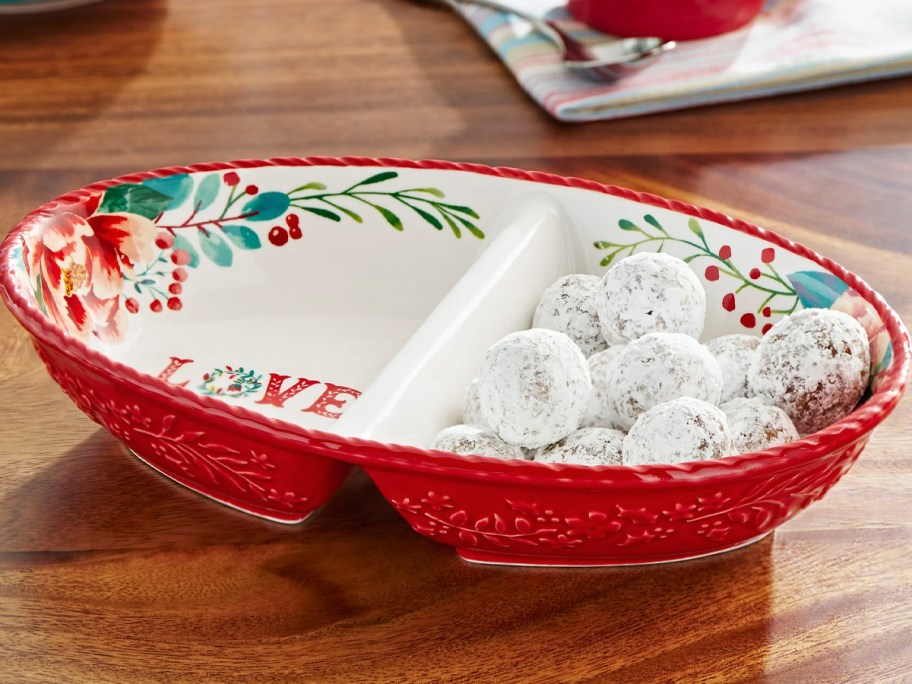 red floral serving bowl on table