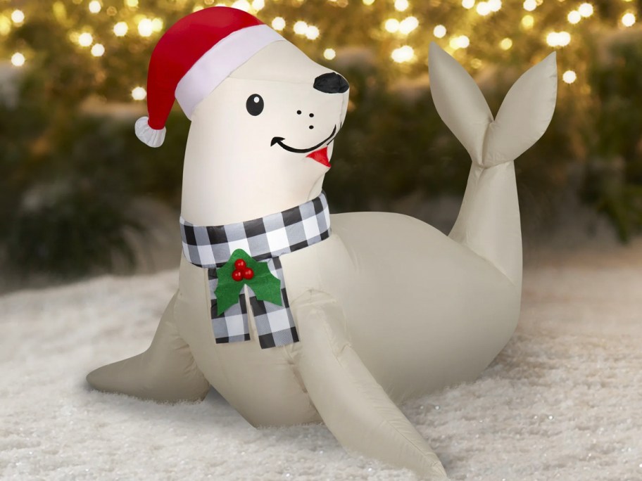 gray seal with santa hat inflatable 