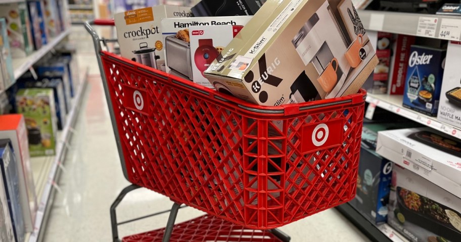 a Target cart in the middle of a kitchen small appliance aisle filled with a Keurig coffee machine, Crock pot slow cooker, Dash mini waffle maker and more!