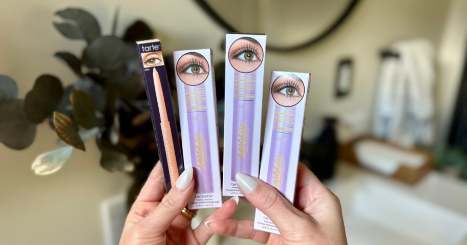 tarte mascara and eye highlighter boxes in-hand