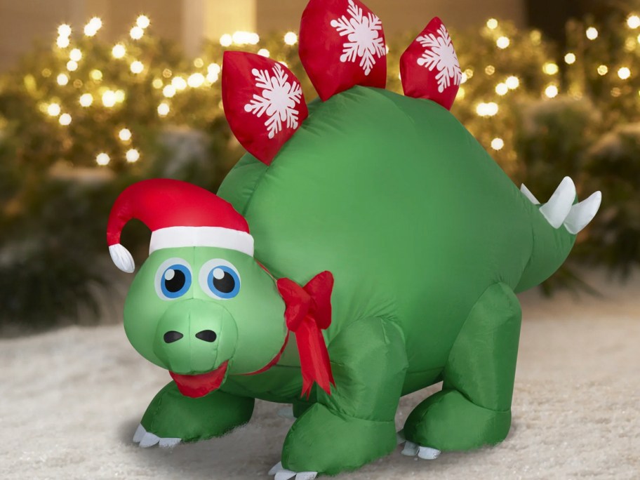 green and red stegasaurus inflatable