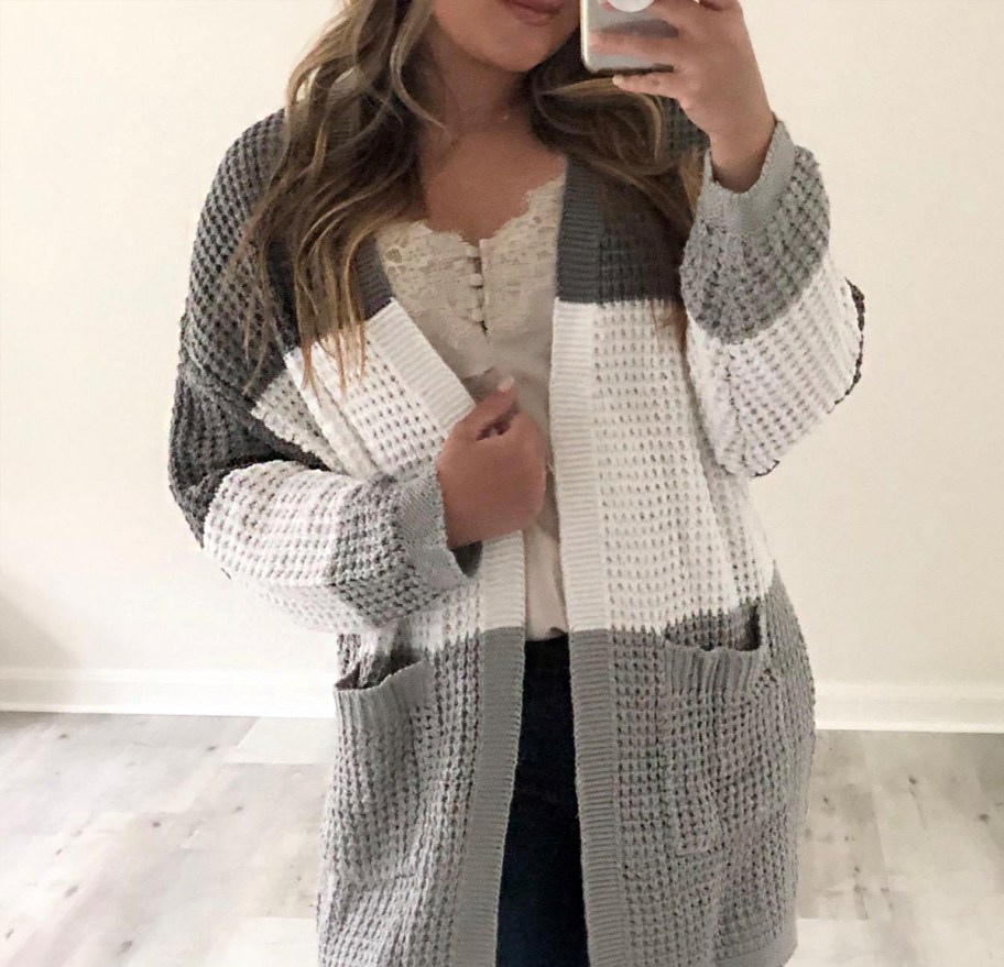 woman wearing gray and white colorblock cardigan