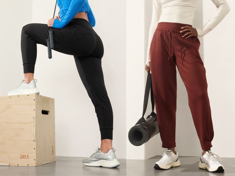 two women in black and maroon joggers