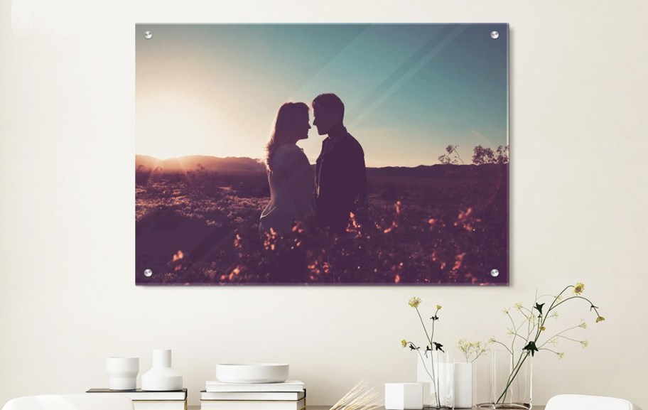 acrylic print of man and woman on wall