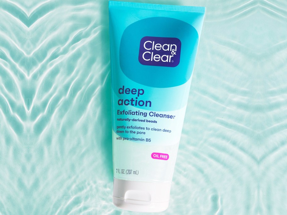 bottle of Clean & Clear Deep Action Exfoliating Cleanser in water