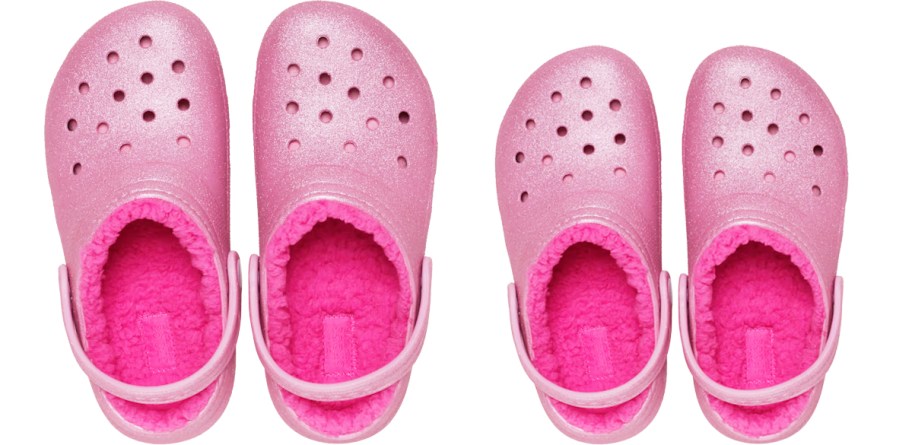 two pairs of glittery pink fleece lined crocs