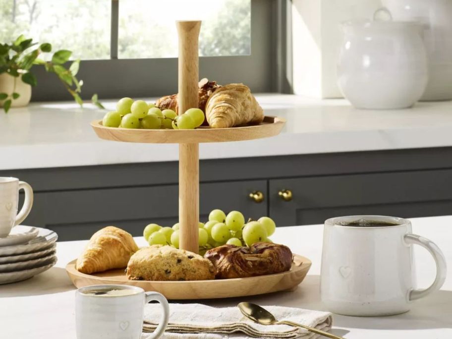 Hearth & Hand w/ Magnolia 2-Tier Rubberwood Serving Tray with food on it in kitchen