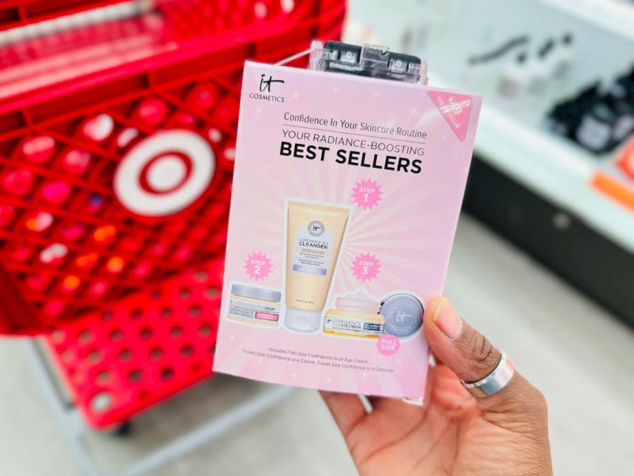 A person holding an IT Cosmetics Best Sellers box