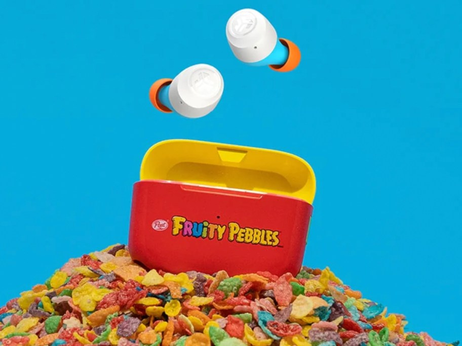 earbuds on fruity pebbles pile