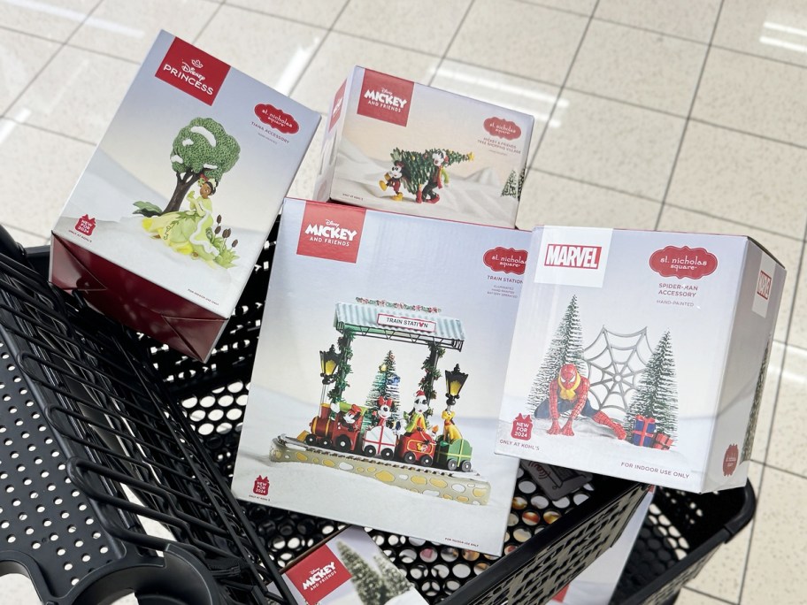 disney christmas village pieces in black shopping cart