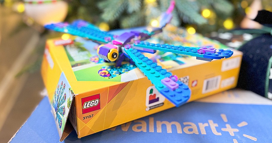lego dragonfly on top of its box on a walmart box