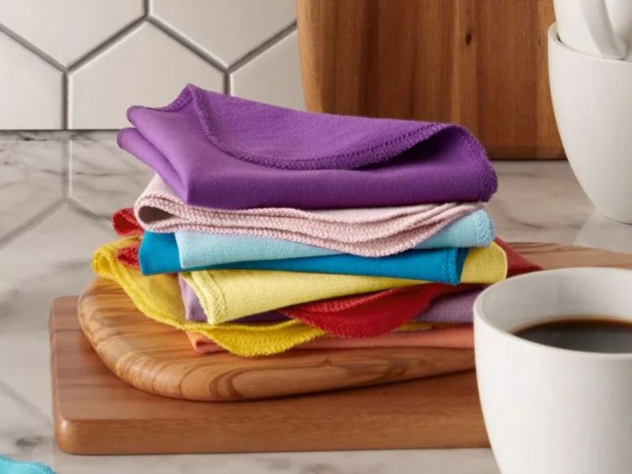 Mainstays Dish Towel 10-Piece Set - Rainbow stacked on cutting board in kitchen