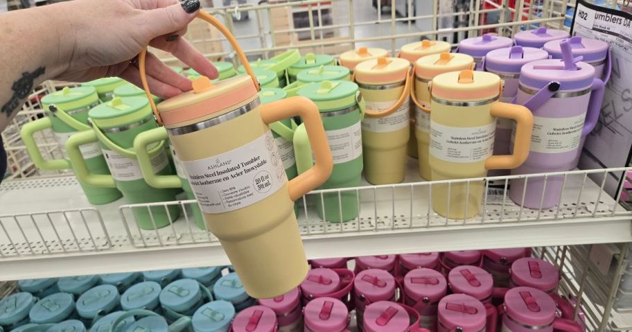 a person holding a yellow Michael's Ashland Insulated Tumbler w Handle