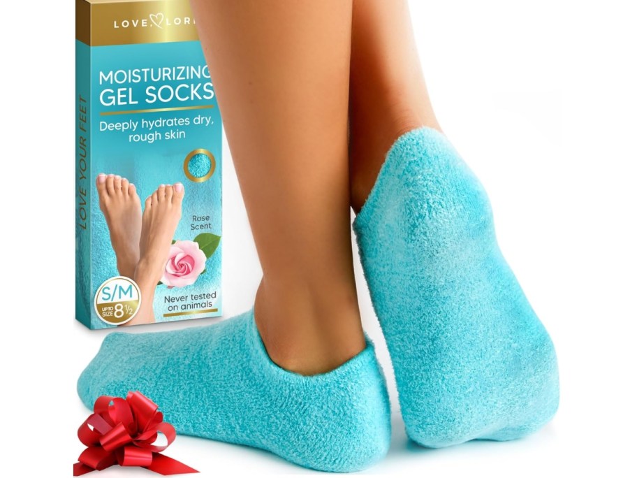 woman wearing moisturizing gel socks in blue