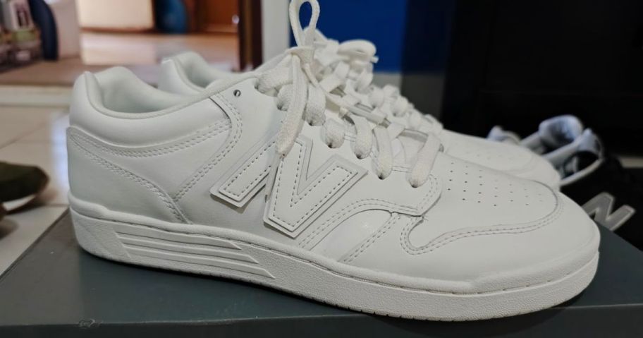 White New Balance Sneakers on a shoebox