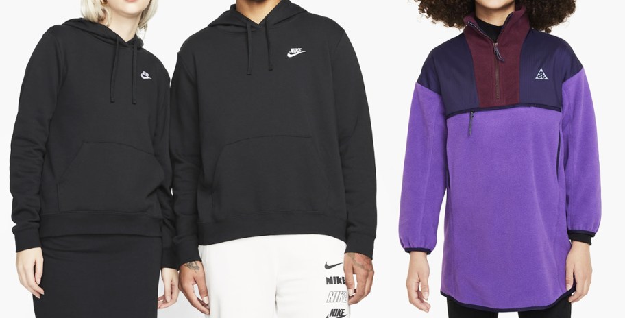 man and woman in matching black nike hoodies and girl in purple tunic