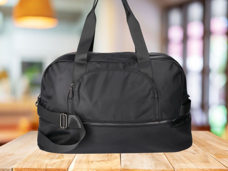 No Boundaries Weekender Bag - Black on table