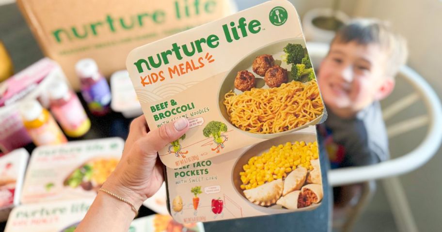 hand holding two nurture life kids meals