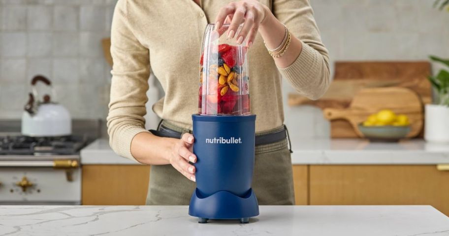 person using Nutribullet Pro Single Serve Blender