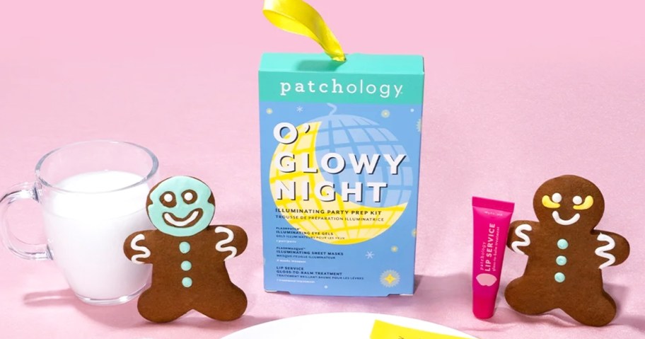 Patchology gift set box near gingerbread men cookies and milk