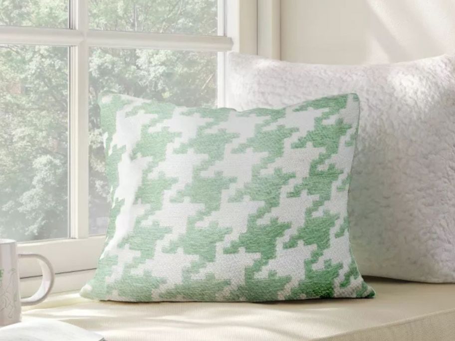 Room Essentials Square Houndstooth Woven Jacquard Chenille Pillow in Green/White on bench