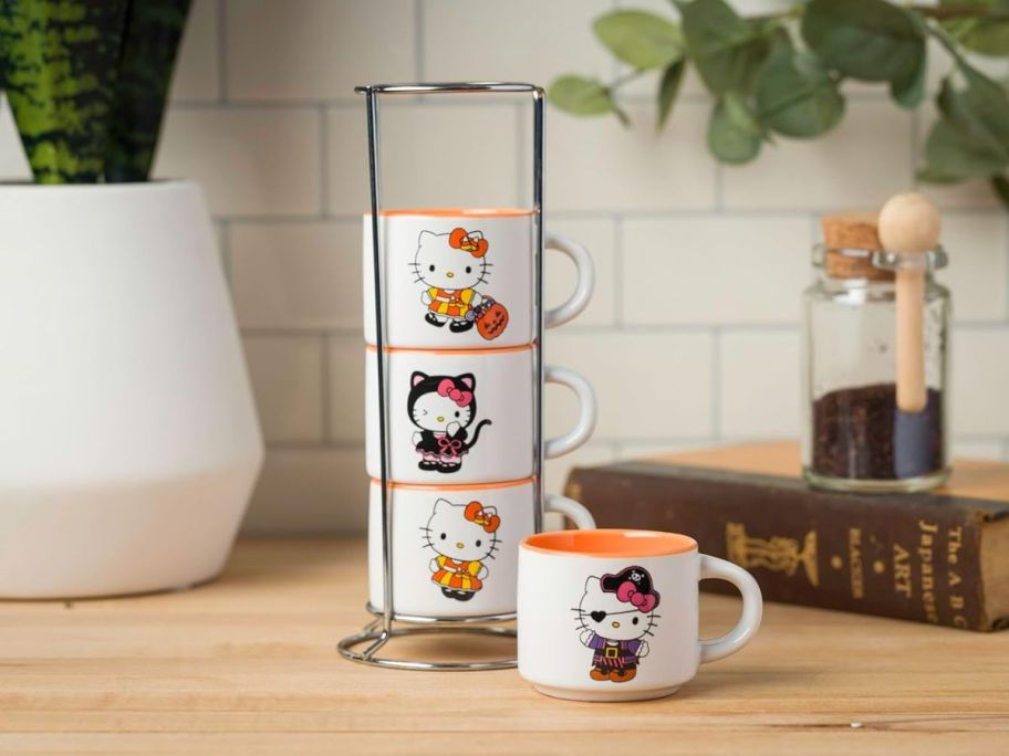 Silver Buffalo Stackable Cup Set - Hello Kitty Halloween on counter