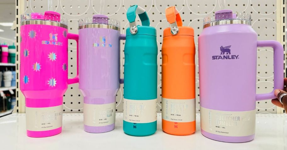 Stanley Tumblers in various sizes and colors on a shelf at Target