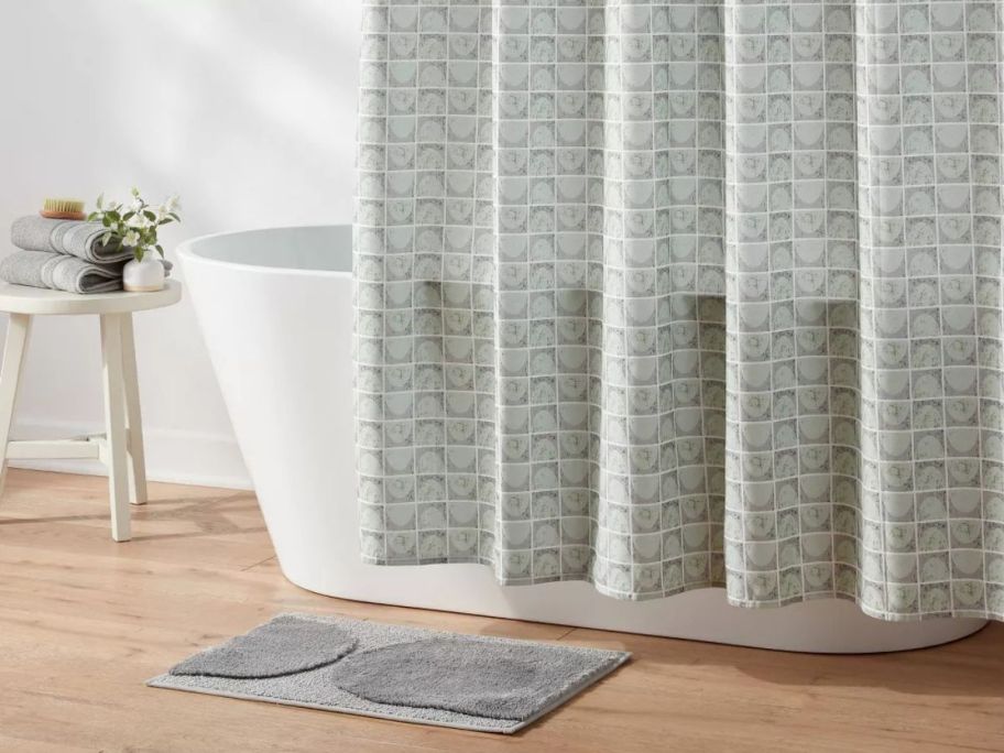 Threshold 14-Piece Leap Quesille Shower Curtain Set in bathroom