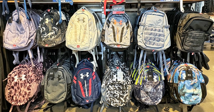 display of under armour backpacks in store