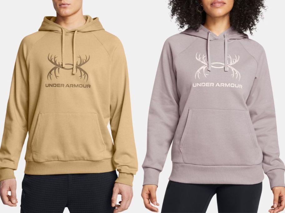 Stock images of a man and a woman wearing Under Armour fleece antler logo hoodies