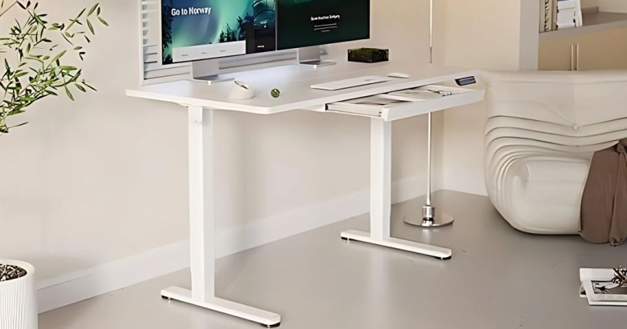 A white standing desk in a bedroom