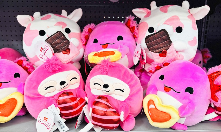 various pink ZURU Snackles Valentine's Day Plushes on store shelf