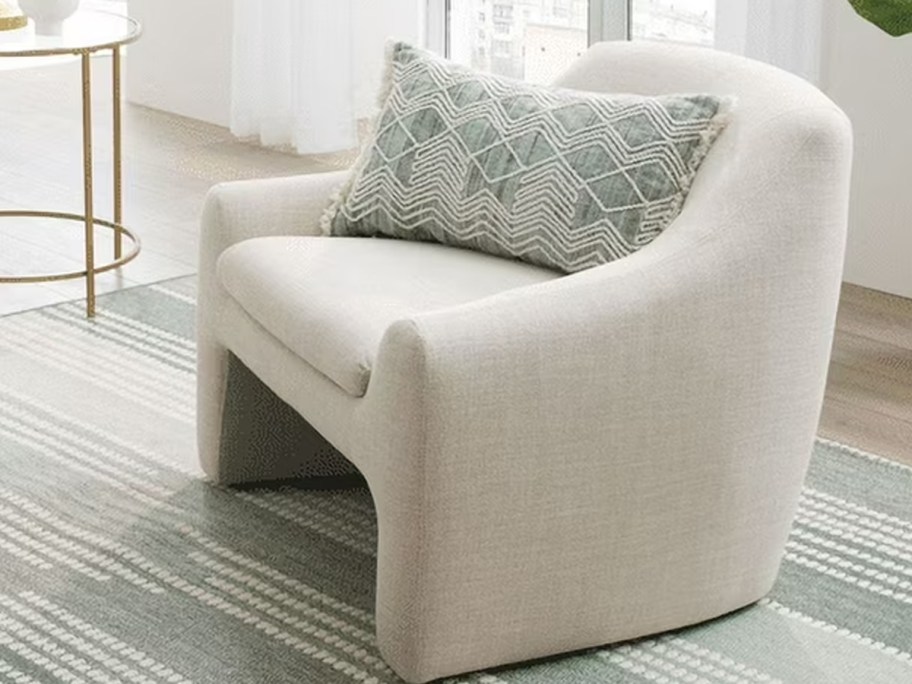 beige accent chair in living room 