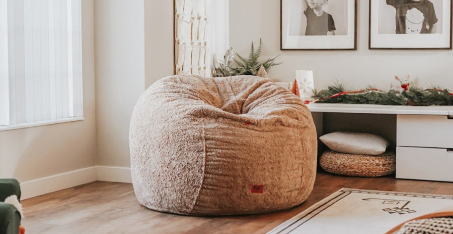 brown faux fur bean bag on floor