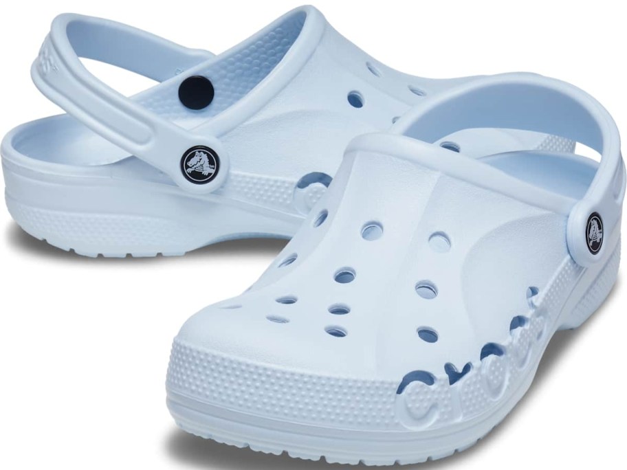 a pair of light blue adults Crocs clogs shoes