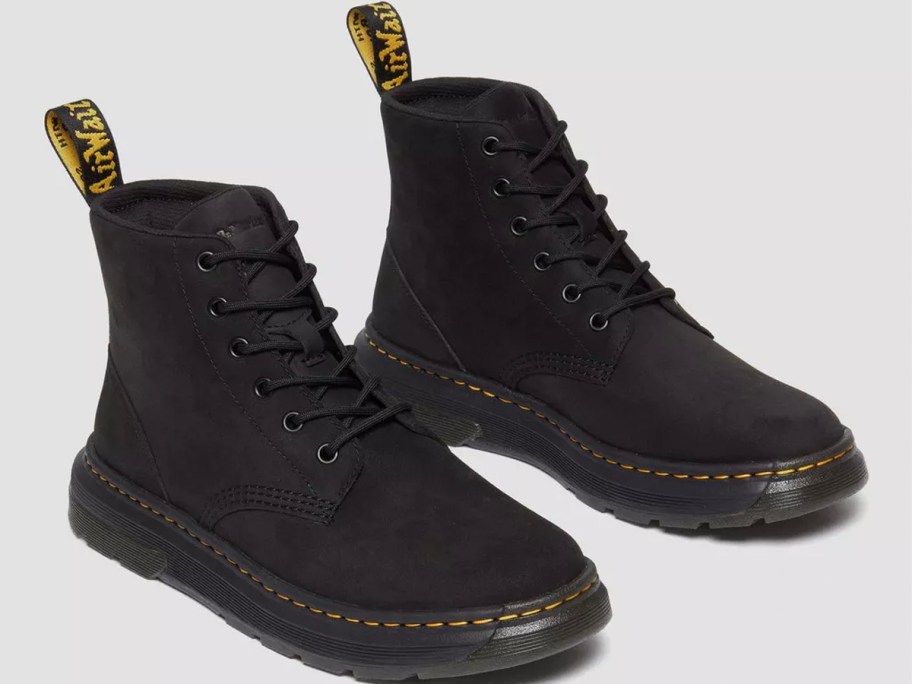 pair of black dr martens boots 