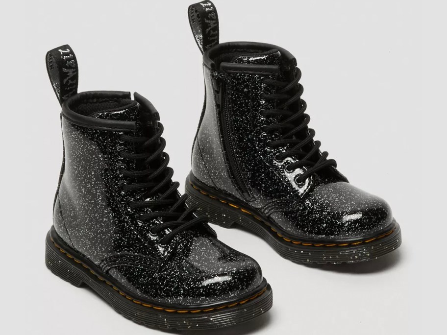 pair of black glitter dr marten boots