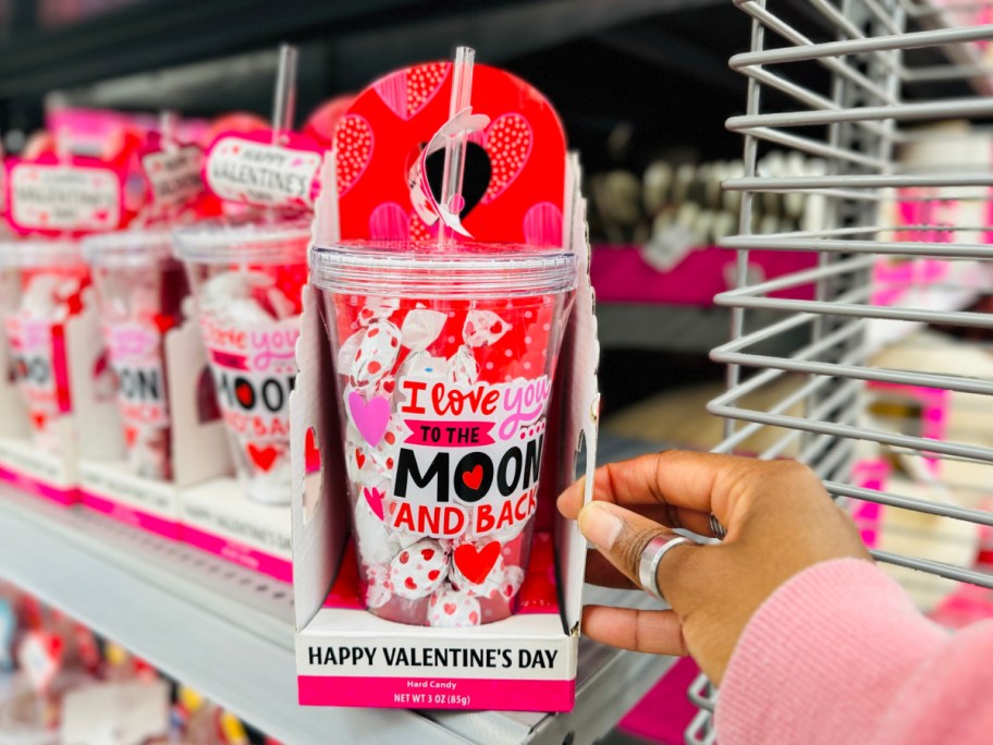 hand holding Way To Celebrate Valentine's Day Love You to the Moon Tumbler & Candy Gift Set