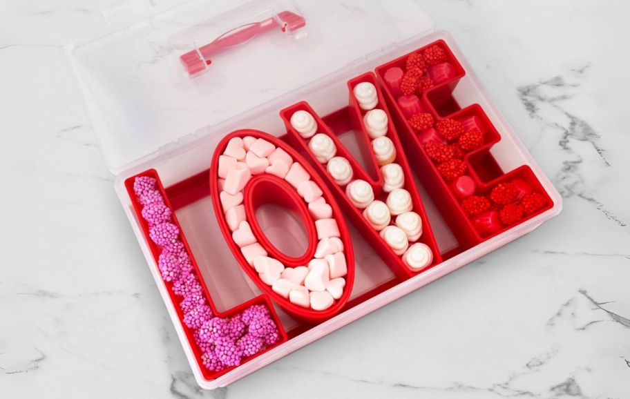 love word shaped snackle box filled with treats