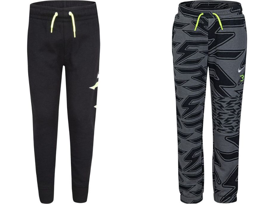 stock images of two nike kids fleece joggers